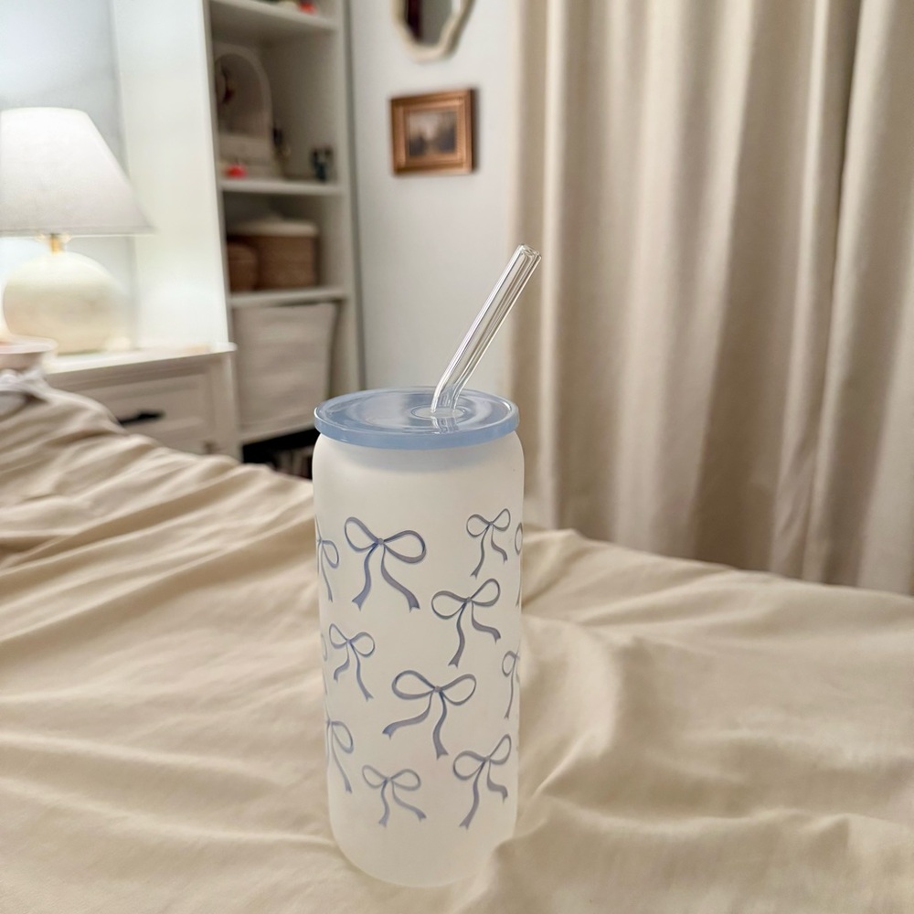 Frosted Glass Tumbler with Blue Bow Pattern.